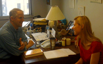 Professor DeWind counsels a student