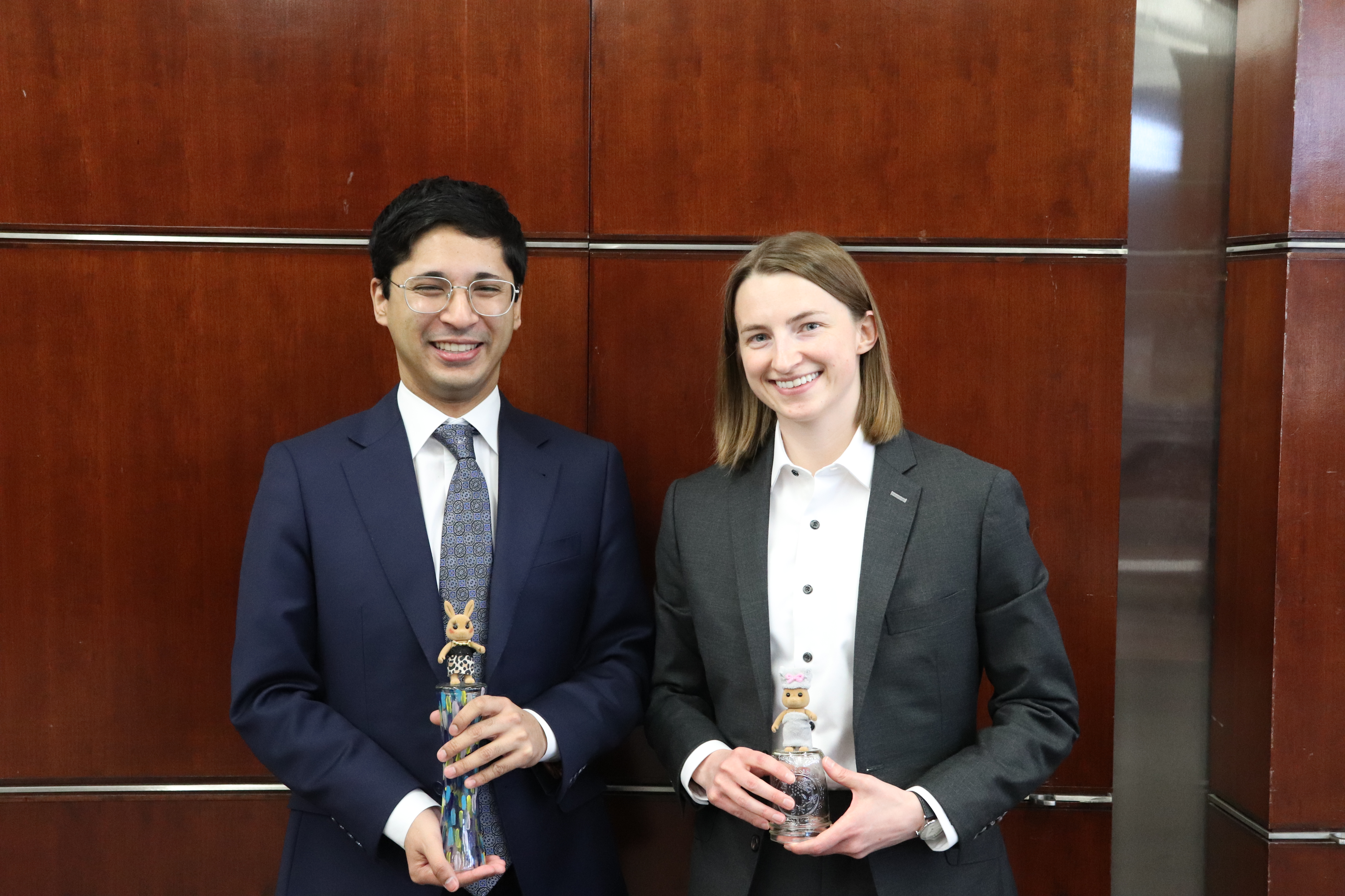 Jack Miller and Haley Johnston holding their trophies