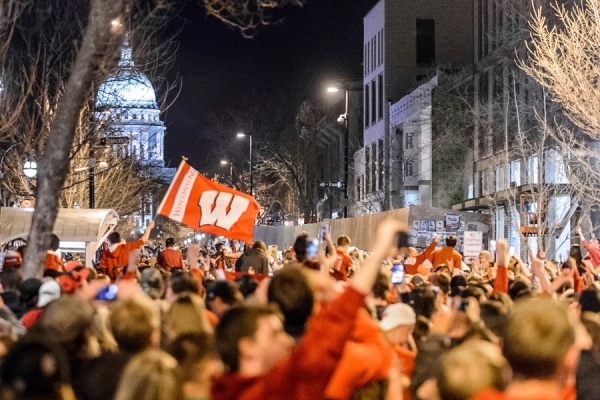 state st with UW fans celebrating a basketball win