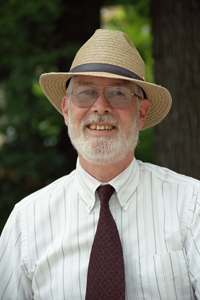 headshot of the late Professor John Kidwell