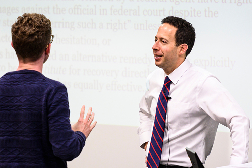 UW Law student talking to Professor Yablon