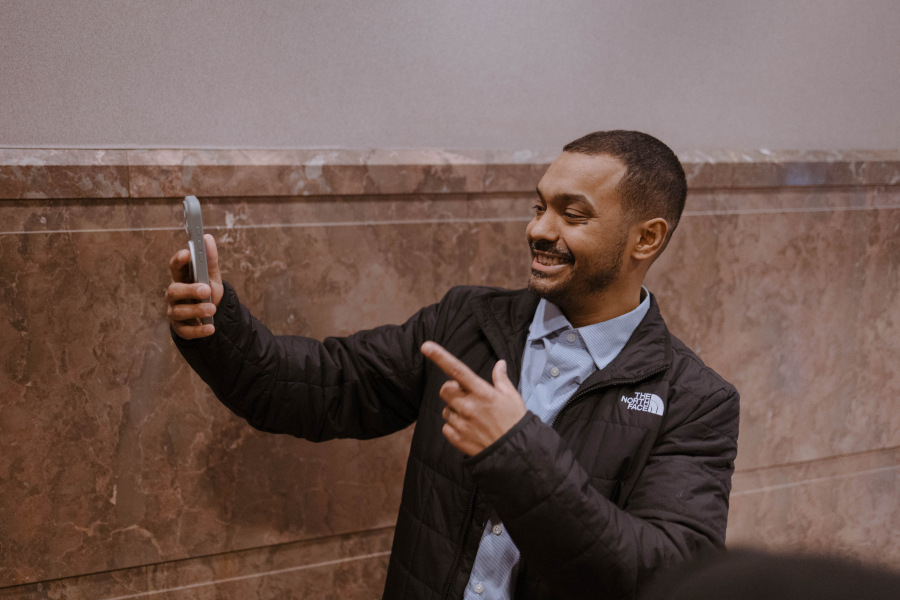 A man smiles for the camera.