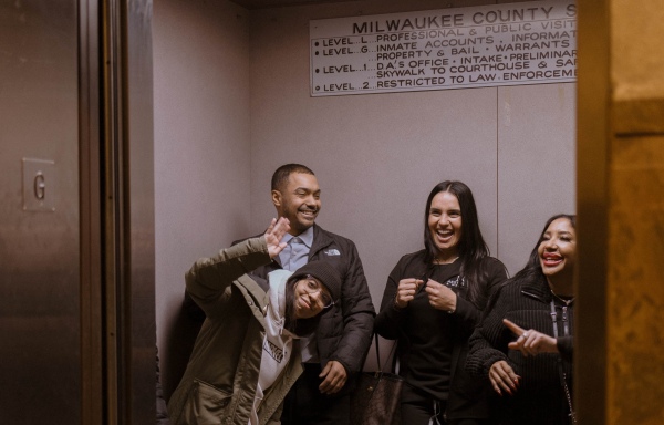 The loved ones of Manuel Cucuta (second from left) join him in the elevator Nov. 26, 2024, upon Cucuta's release from prison. From left are his sister, Carolina; his partner, Sonia; and his mother, Nereida.