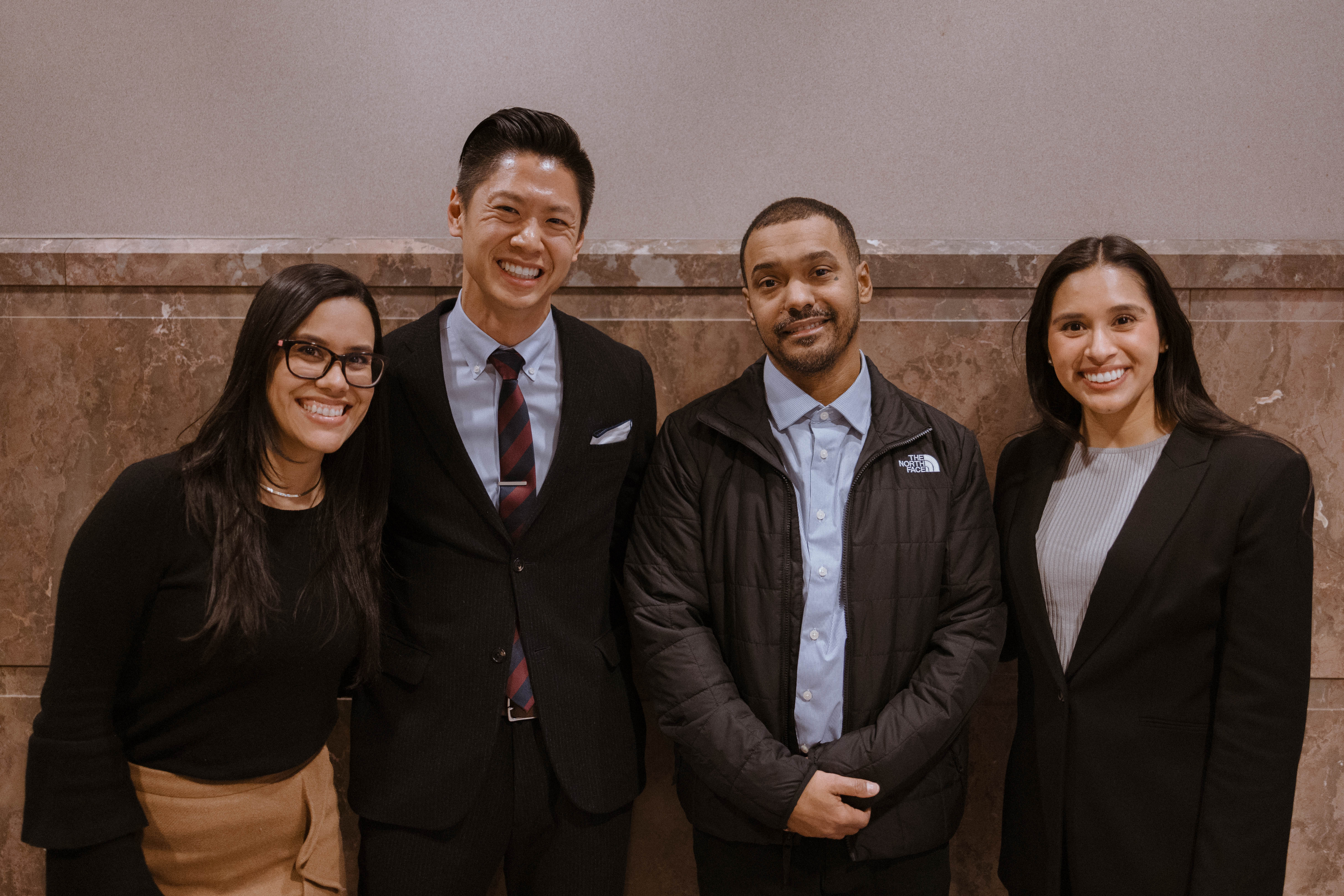 University of Wisconsin Law School students Gabriella Marquez (left) and Noemi Reyes (right) pose with Wisconsin Innocence Project Co-Director Christopher Lau (second from left) and Manuel Cucuta on Nov. 26, 2024, upon Cucuta's release from prison.