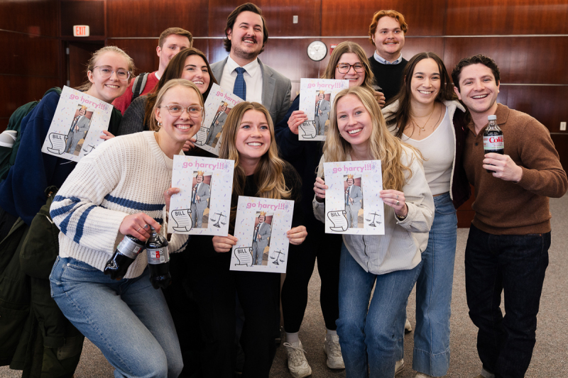 A group of law students celebrating together.