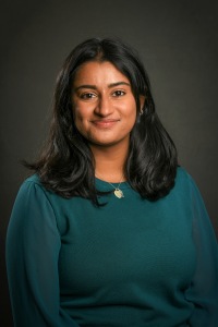 Headshot photo of Savannah Ahluwalia