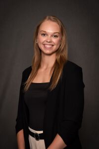 Headshot photo of Ella Collins
