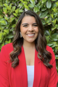 woman with red blazer and white shirt