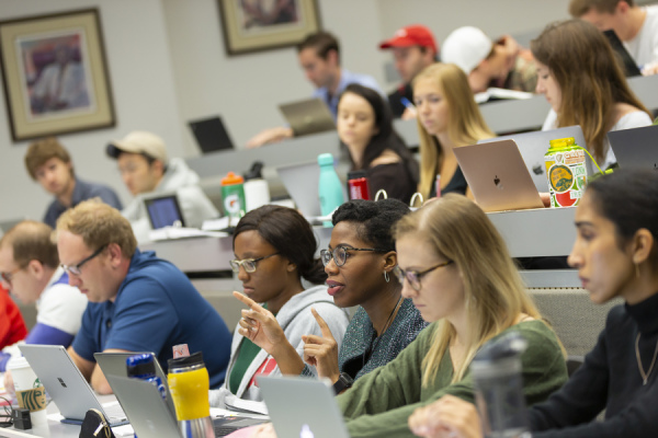 students sit in a lecture hall