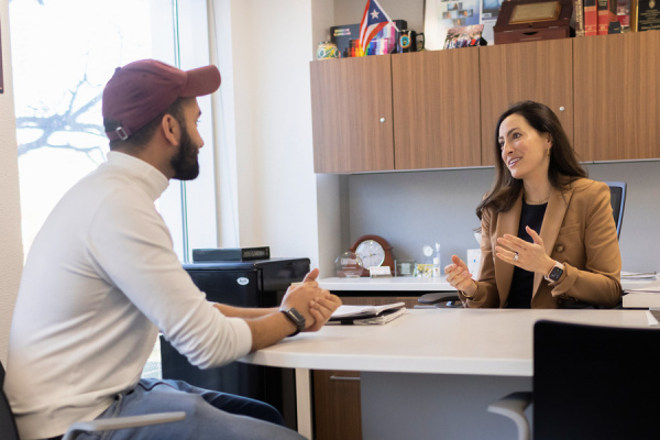 student talking with our head of Admissions Rebecca Schuller