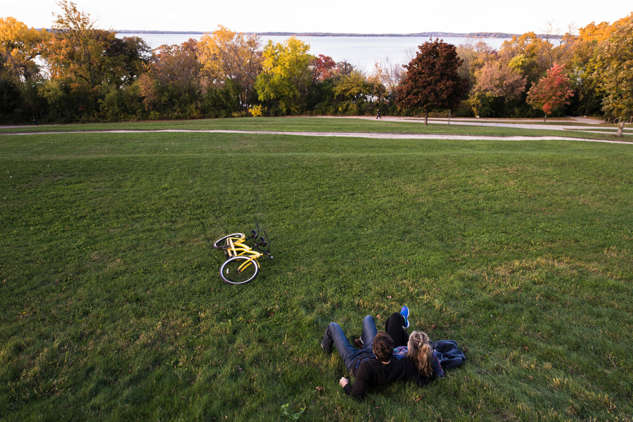 students on hill overlooking Lake Mendota